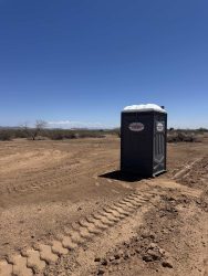 Southwest Sanitation porta potty on a desert job site in Arizona
